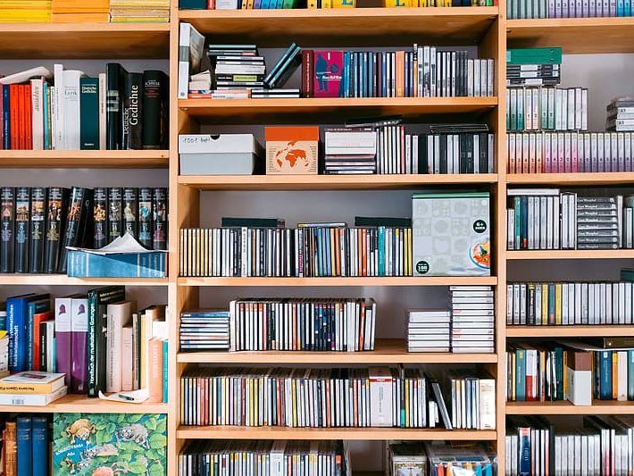 bookshelf-with-books-and-cds